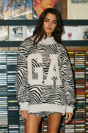 BUCKET LIST Zebra Print "GA" Applique Mock-neck Sweatshirt